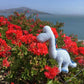 Gestrickte Bio-Baumwoll-Baby-Rassel Diplodocus Dinosaurier in Blau
